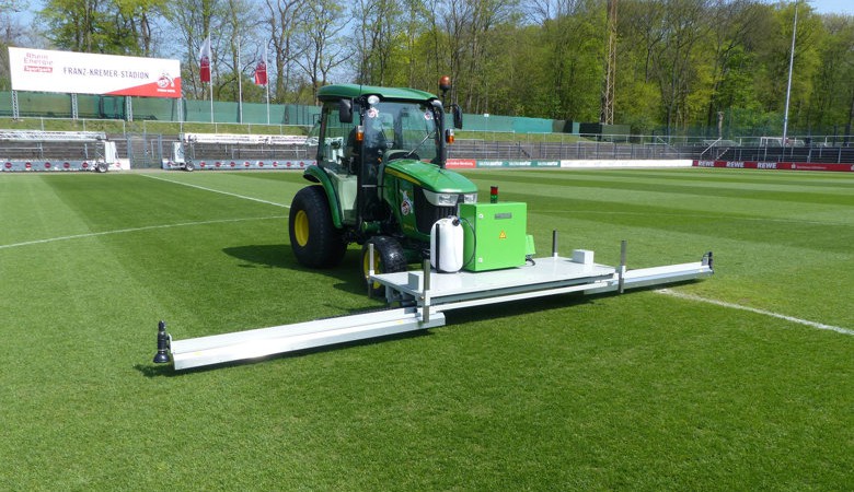  Mobile RHENAC UVC 600 lawn disinfector in use on sports surfaces